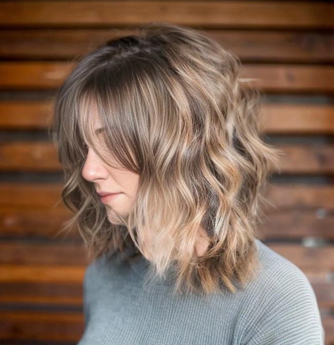 Medium Layered Hairstyle With Wispy Bangs