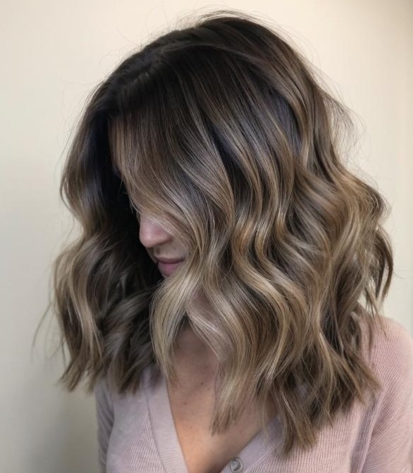 Mid-Length Cut With Subtle Blonde Balayage