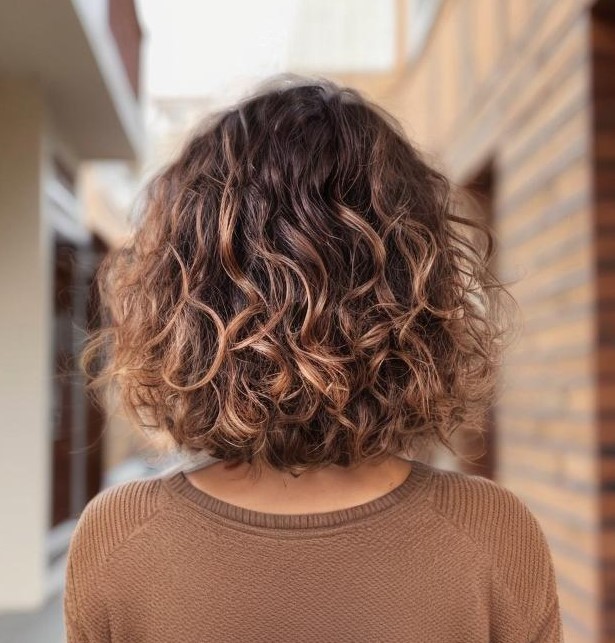 Brown Curly Bob With Rosewood Balayage