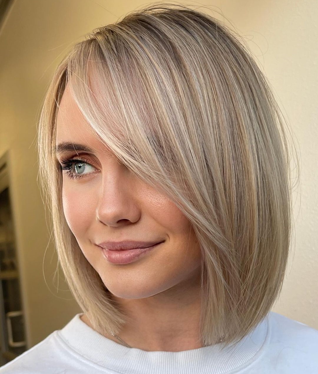 Swoop Bang on Short Blonde Bob Cut