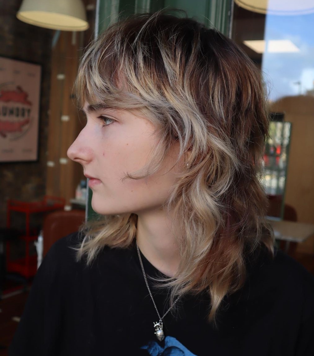 Short Wolf Cut with Blonde Highlights