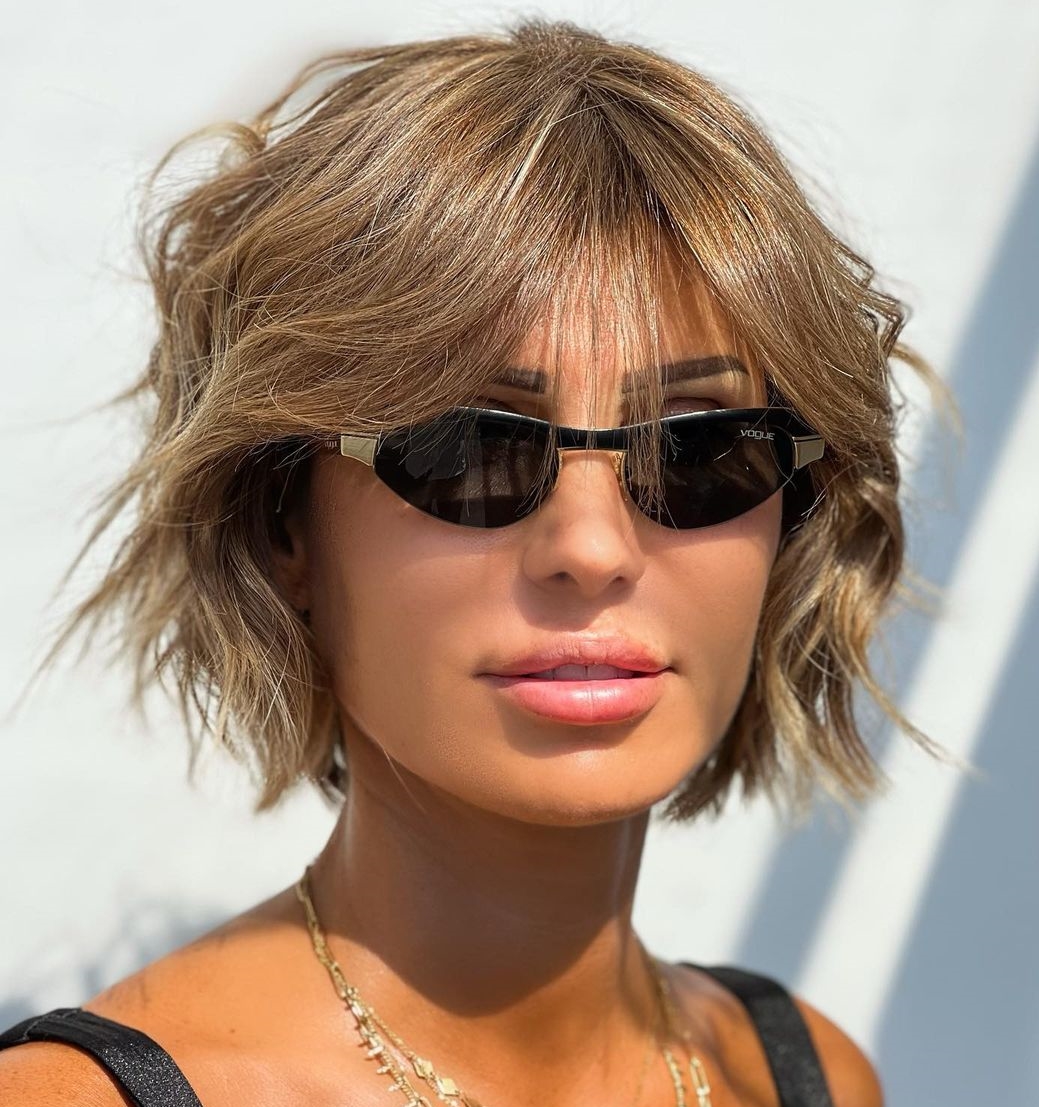 Wispy Bang on Short Blonde Bob Cut