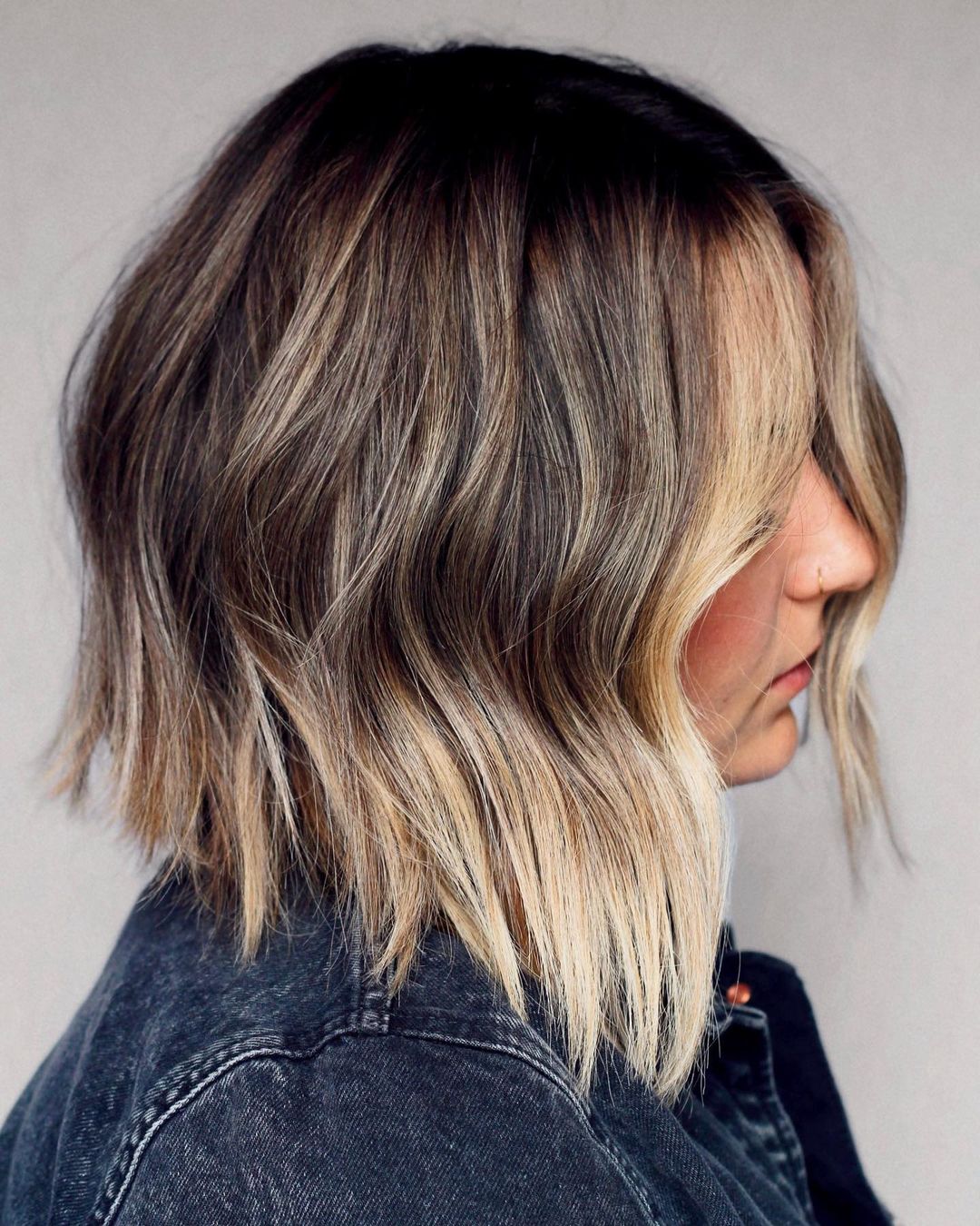 Blonde Money Piece Highlights on Dark Bob Cut