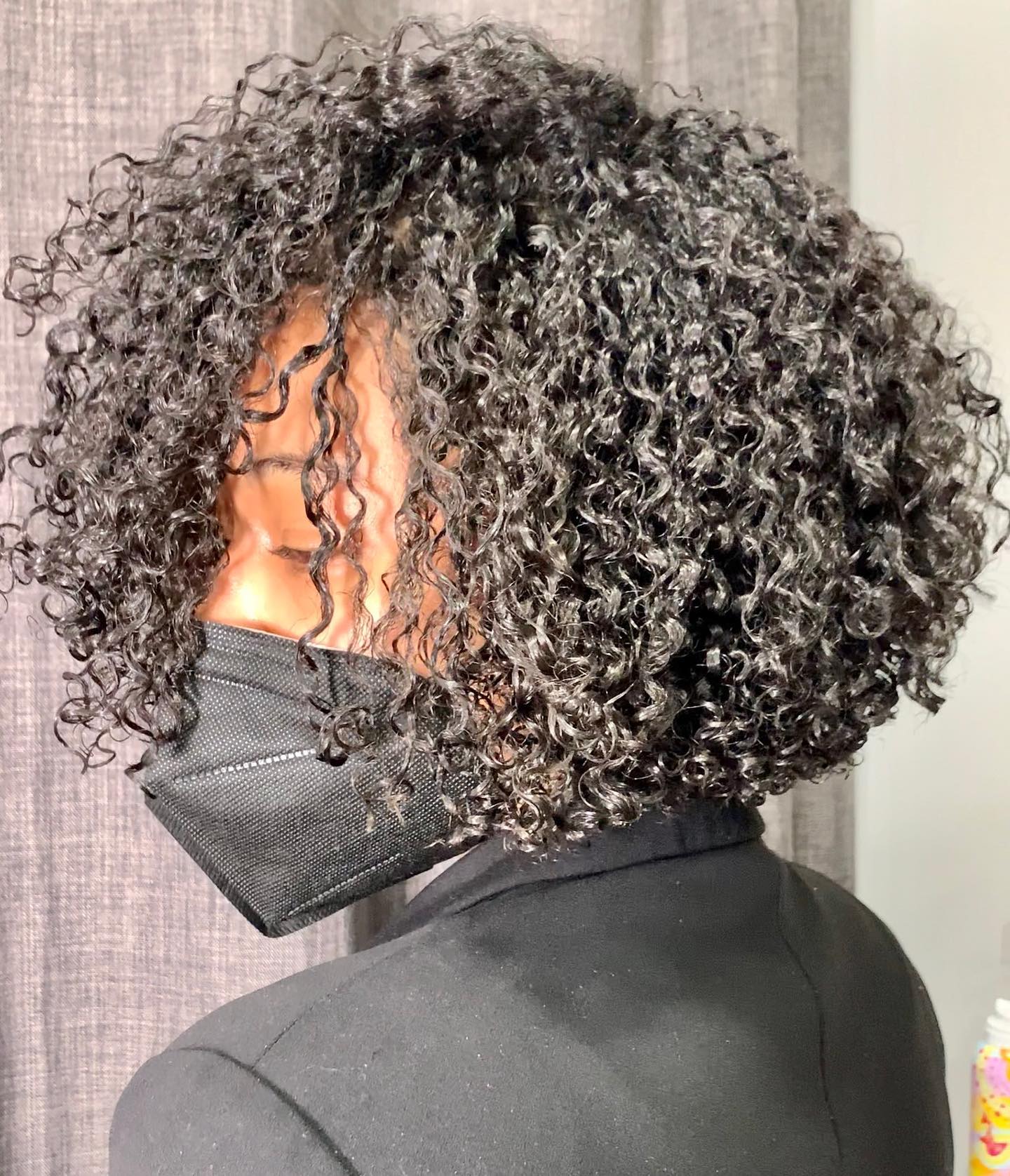 Jaw-length Curly Black Bob