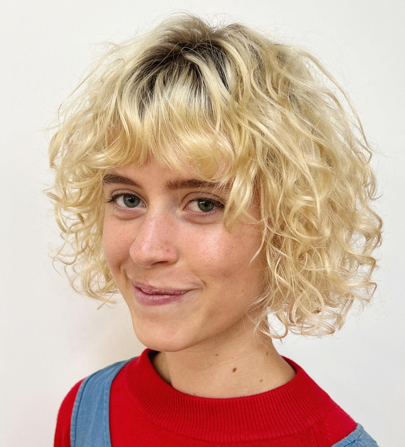 Thin Short Curly Hair with Dark Roots