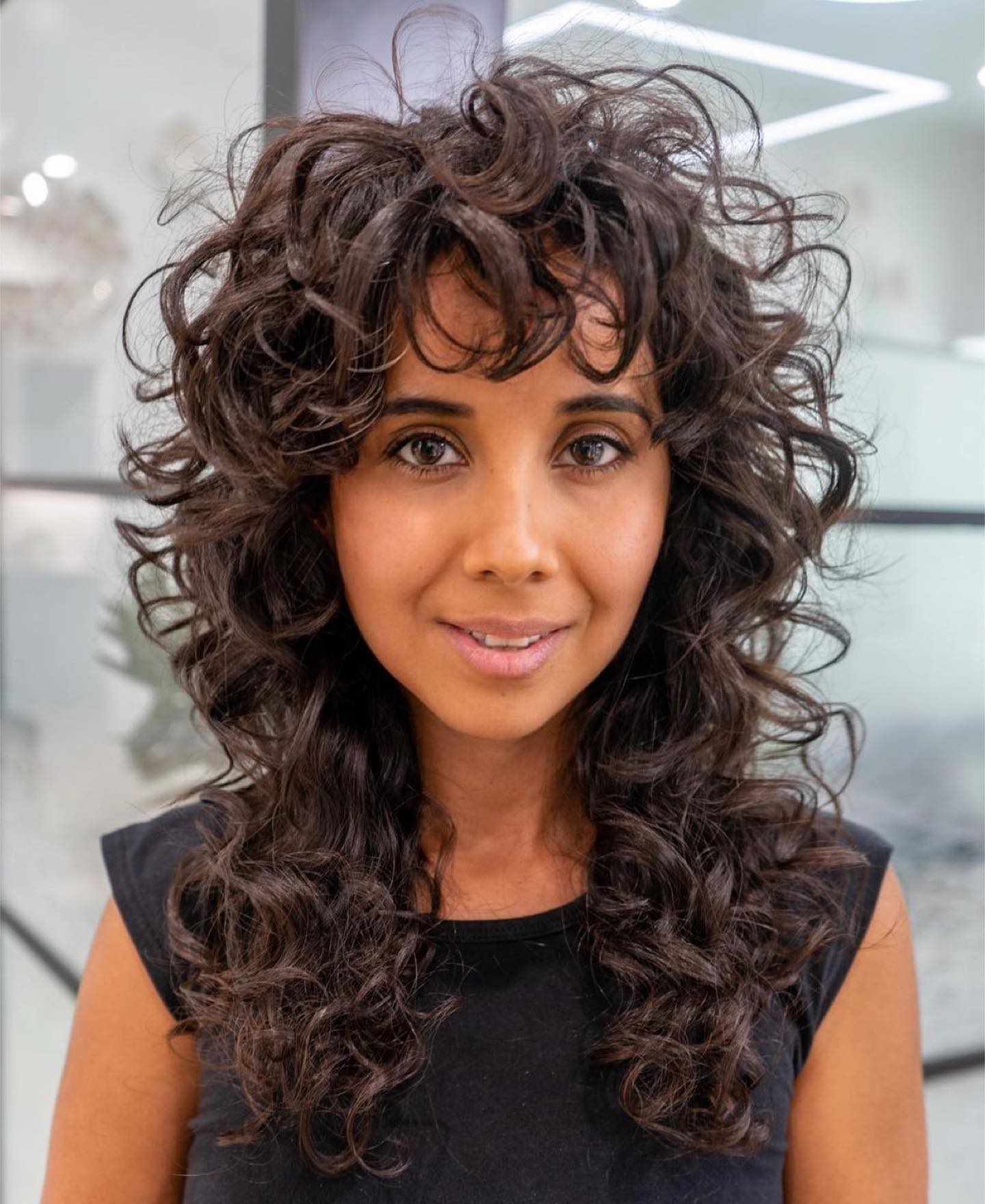 Butterfly Cut on Curly Brown Hair