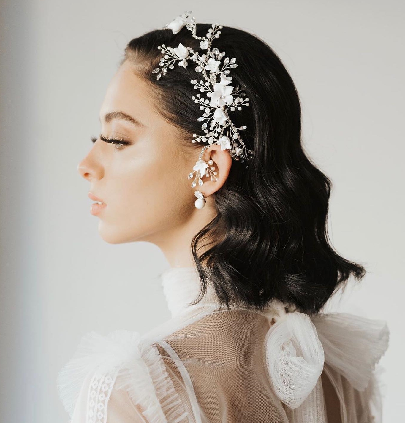 Medium Length Wedding Hairstyle with Floral Decor