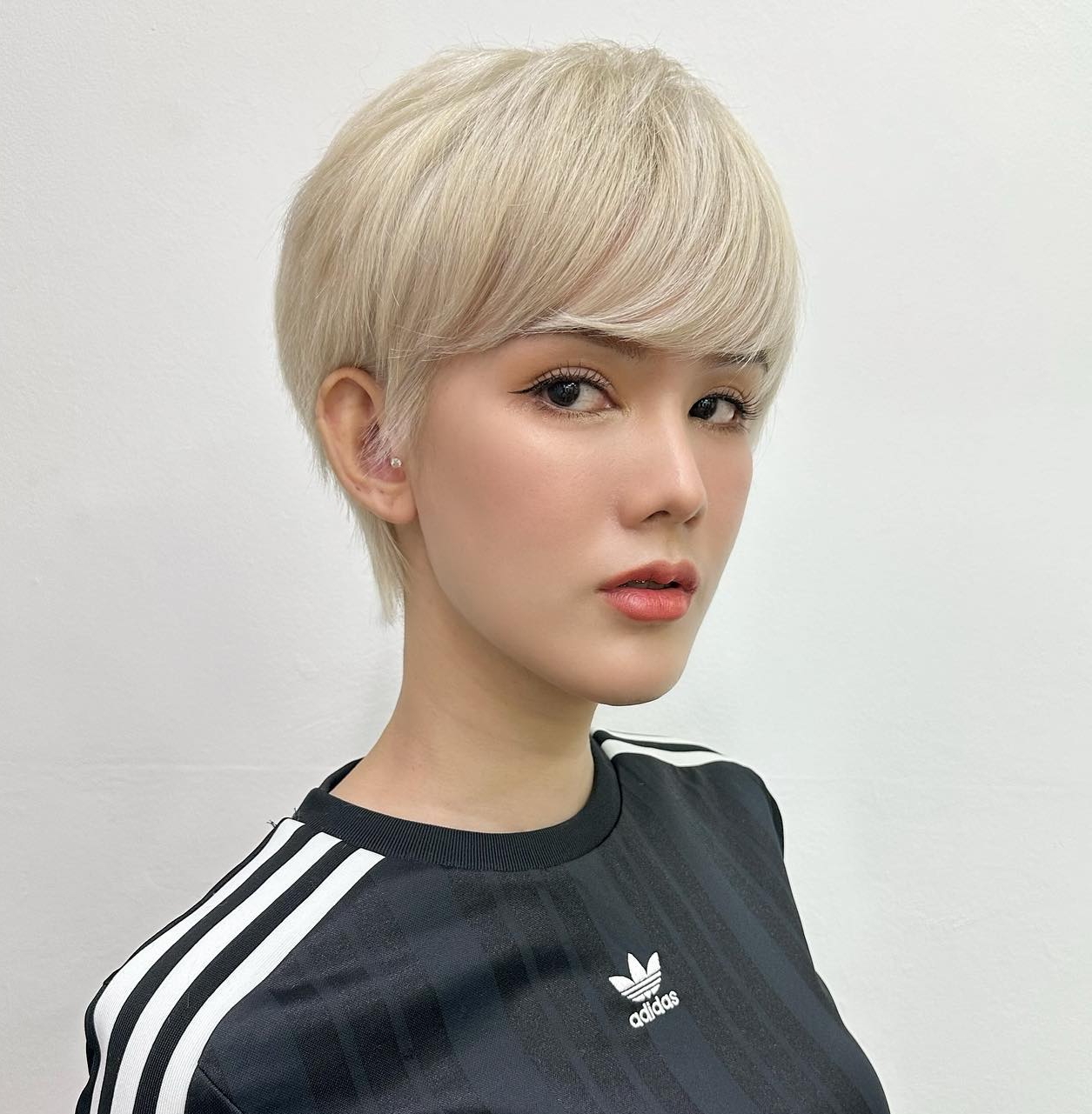 Short Blonde Hair with Long Straight Bang