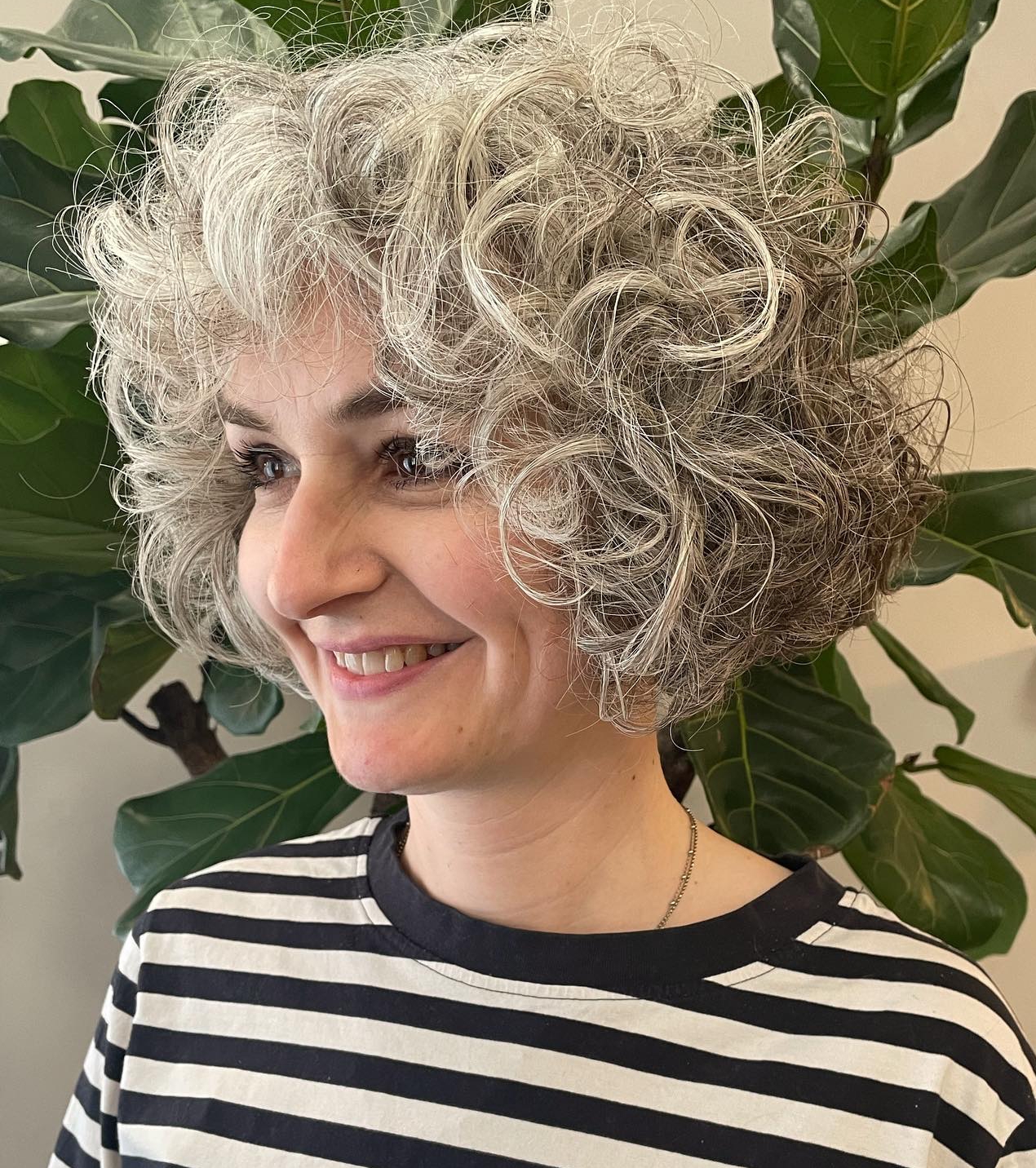 Bouncy Curls with Bang on Silver Bob Cut