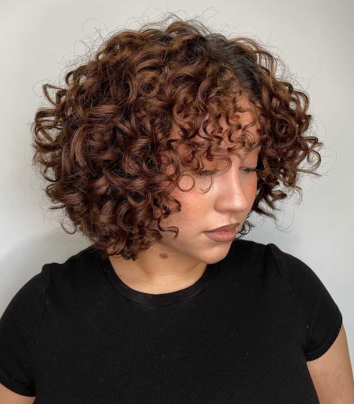 Short Bob with Curly Bang on Brown Hair