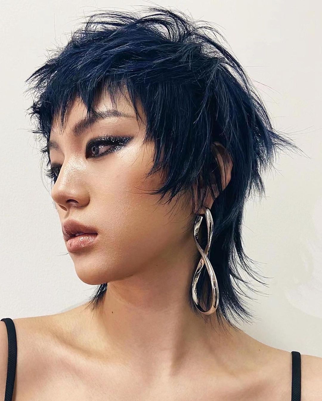 Choppy Layered Wolf Cut on Short Black Hair