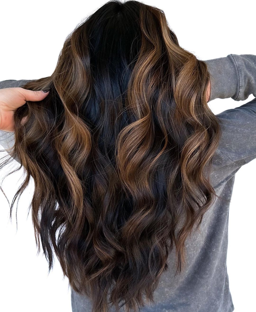 Copper Highlights on Black Wavy Hair