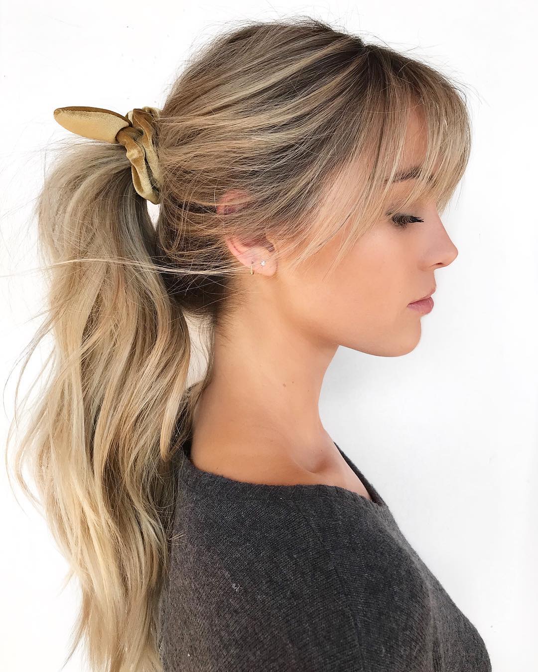 Voluminous Long Ponytail With Wispy Bangs