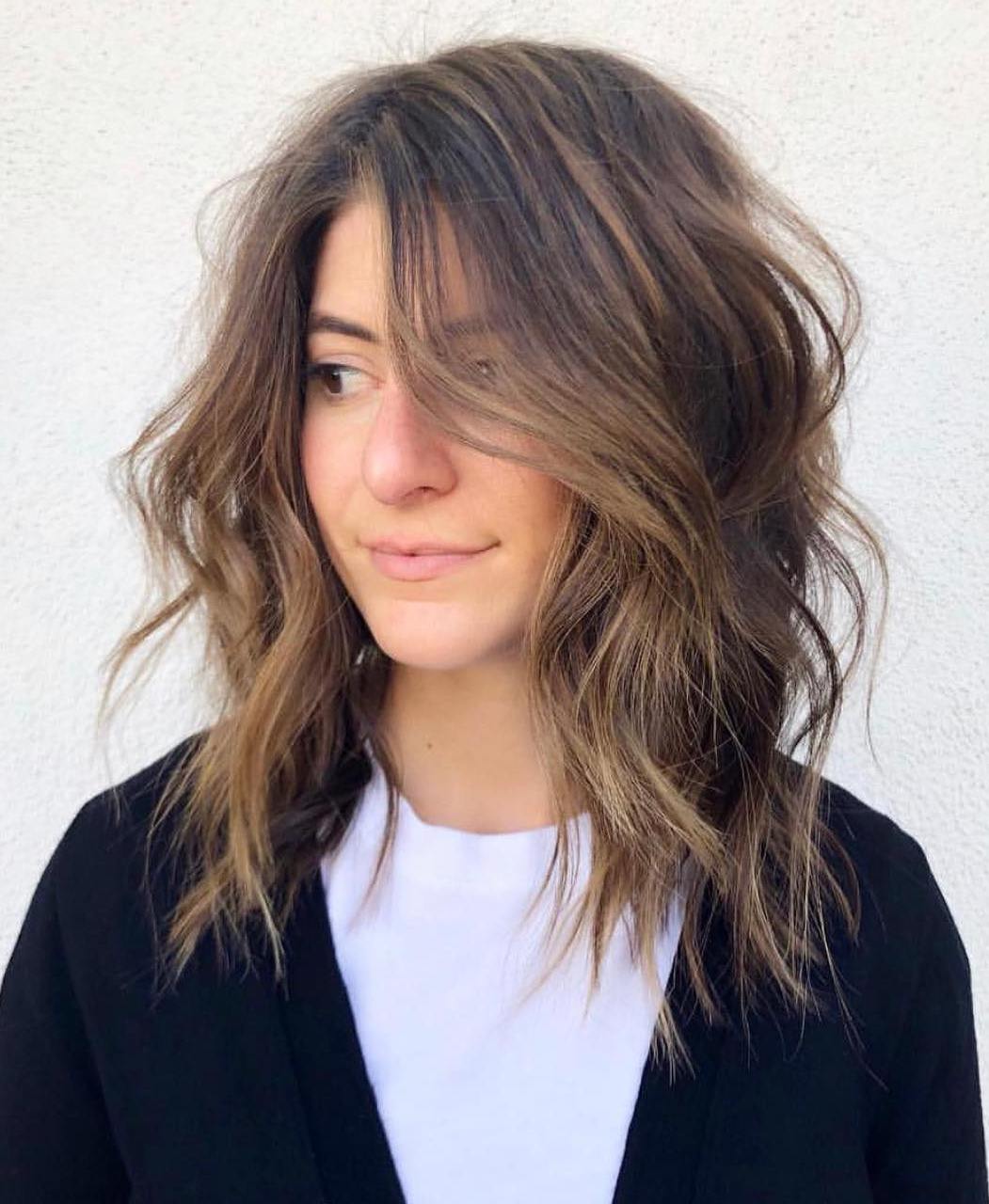 Shoulder-Length Layered Hair With Long Bangs