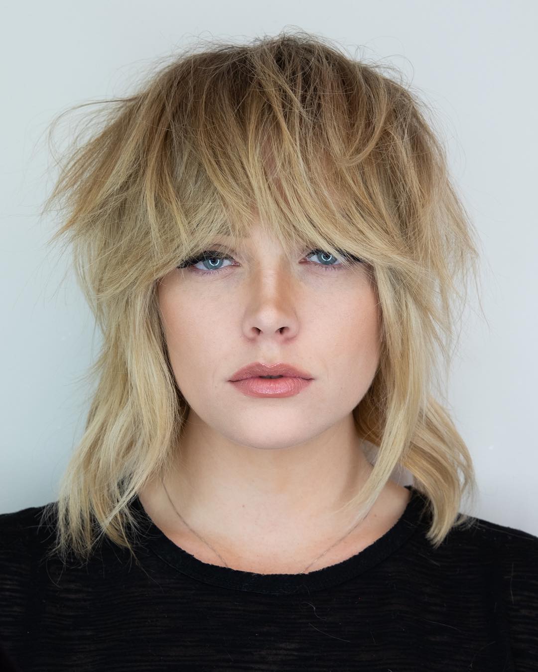 Medium Shag With Short Layers And Bangs